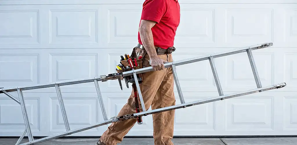 Garage door repair technician arriving with tools and ladder in Tulsa, OK