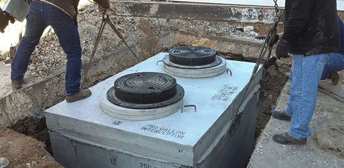 Grease trap installation for a commercial property drainage system in Tulsa, OK