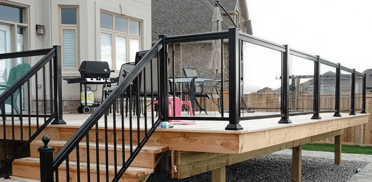 Handrail installation on a deck staircase for safety and code compliance in Tulsa, OK